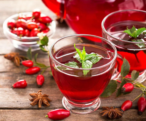 Healing Rosehip and Hibiscus Tea with Rose Petals, a vibrantly flavored drink, hot or cold!