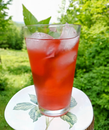 Healing Rosehip and Hibiscus Tea with Rose Petals, a vibrantly flavored drink, hot or cold!
