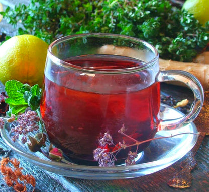 Healing Rosehip and Hibiscus Tea with Rose Petals, a vibrantly flavored drink, hot or cold!